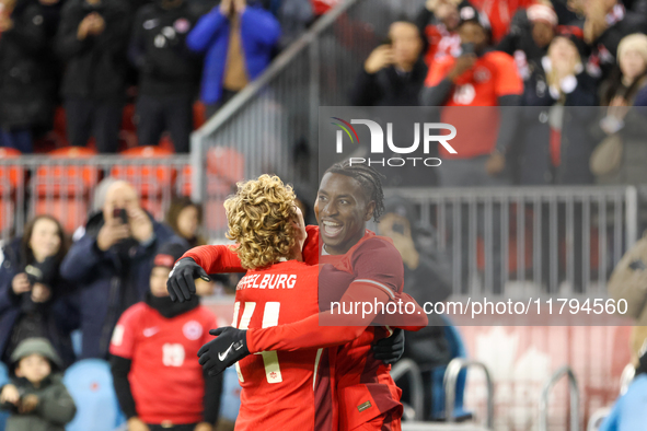 M. Bombito #15 celebrates his goal with J. Shaffelburg #14 before it is disallowed during the CONCACAF Nations League Quarter Final match be...