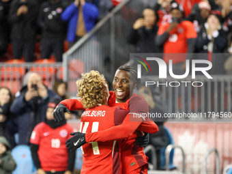 M. Bombito #15 celebrates his goal with J. Shaffelburg #14 before it is disallowed during the CONCACAF Nations League Quarter Final match be...