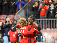 M. Bombito #15 celebrates his goal with J. Shaffelburg #14 before it is disallowed during the CONCACAF Nations League Quarter Final match be...