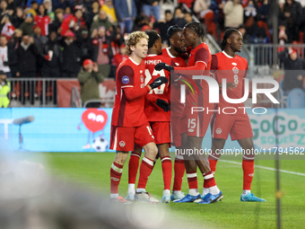 J. Shaffelburg #14 celebrates his second goal with C. Larin #9, Bombito #15, A. Ahmed #23, and Ismael Kone #8 during the CONCACAF Nations Le...