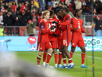 J. Shaffelburg #14 celebrates his second goal with C. Larin #9, Bombito #15, A. Ahmed #23, and Ismael Kone #8 during the CONCACAF Nations Le...