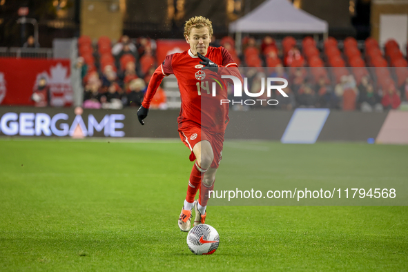 J. Shaffelburg #14 is in action during the CONCACAF Nations League Quarter Final match between Team Canada and Suriname at BMO Field in Toro...