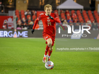 J. Shaffelburg #14 is in action during the CONCACAF Nations League Quarter Final match between Team Canada and Suriname at BMO Field in Toro...