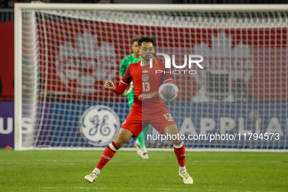 M. Choiniere, number 13, plays in the CONCACAF Nations League Quarter Final match between Team Canada and Suriname at BMO Field in Toronto,...