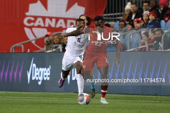 In Toronto, Ontario, Canada, on November 19, 2024, Richie Laryea #22 battles Sheraldo Becker #11 at the CONCACAF Nations League Quarter Fina...