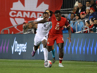 In Toronto, Ontario, Canada, on November 19, 2024, Richie Laryea #22 battles Sheraldo Becker #11 at the CONCACAF Nations League Quarter Fina...