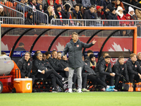 In Toronto, Ontario, Canada, on November 19, 2024, Team Canada's Head Coach Jesse Marsch gives instruction in front of the team bench at the...