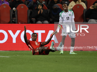 In Toronto, Ontario, Canada, on November 19, 2024, Richie Laryea #22 and Van der Kust both protest to the referee at the CONCACAF Nations Le...