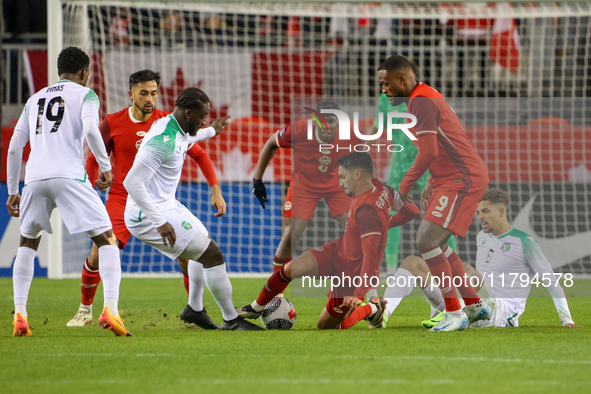 In Toronto, Ontario, Canada, on November 19, 2024, Stephan Eustaquio #7 battles with Justin Lonwijk #8 and Abena #12 while being watched by...