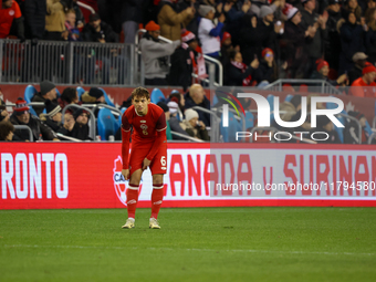 Niko Sigur #6 makes his home debut at the CONCACAF Nations League Quarter Final Match between Team Canada and Suriname at BMO Field in Toron...