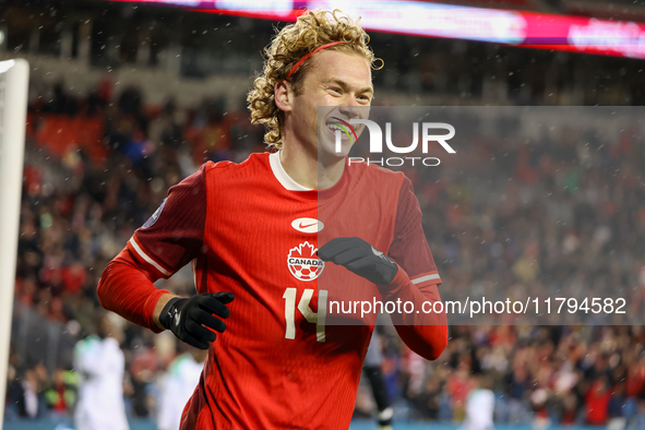 Jacob Shaffelburg #14 celebrates his second goal at the CONCACAF Nations League Quarter Final Match between Team Canada and Suriname at BMO...