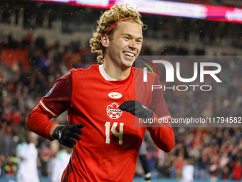 Jacob Shaffelburg #14 celebrates his second goal at the CONCACAF Nations League Quarter Final Match between Team Canada and Suriname at BMO...