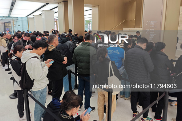 Customers who order Mate X6 foldable screen phones line up in batches at Huawei's global flagship store in Shanghai, China, on November 20,...