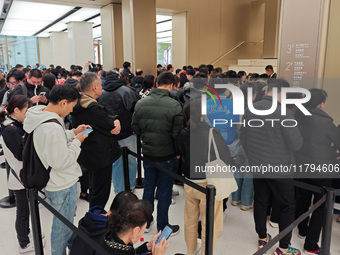 Customers who order Mate X6 foldable screen phones line up in batches at Huawei's global flagship store in Shanghai, China, on November 20,...