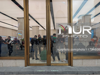 Customers who order Mate X6 foldable screen phones line up in batches at Huawei's global flagship store in Shanghai, China, on November 20,...