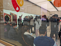 Customers who order Mate X6 foldable screen phones line up in batches at Huawei's global flagship store in Shanghai, China, on November 20,...