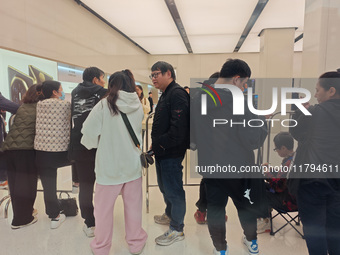 Customers who order Mate X6 foldable screen phones line up in batches at Huawei's global flagship store in Shanghai, China, on November 20,...