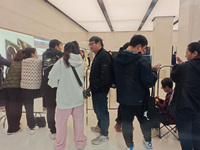 Customers who order Mate X6 foldable screen phones line up in batches at Huawei's global flagship store in Shanghai, China, on November 20,...