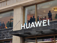 Customers who order Mate X6 foldable screen phones line up in batches at Huawei's global flagship store in Shanghai, China, on November 20,...