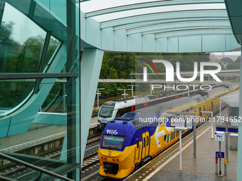 Arnhem Centraal train station in Arnhem, Netherlands, on July 27, 2023, presents a striking view of modern Dutch rail infrastructure. A brig...