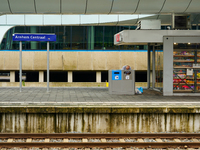 In Arnhem, Netherlands, on July 27, 2023, Arnhem Central Station captures the activity on one of the platforms. A man sorts through a recycl...