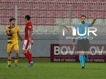 In Ta' Qali, Malta, on November 19, 2024, UEFA appoints match referee Luka Bilbija, who blows for full time during the UEFA Nations League,...