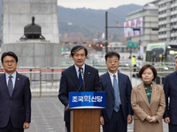 Cho Kuk, leader of the Rebuilding Korea Party, along with party lawmakers, holds a press conference in front of the Admiral Yi Sun-sin statu...