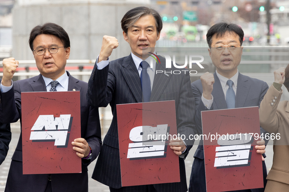 Cho Kuk, leader of the Rebuilding Korea Party, along with party lawmakers, chants slogans during a press conference in front of the Admiral...