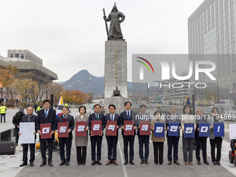 Cho Kuk, leader of the Rebuilding Korea Party, along with party lawmakers, holds a press conference in front of the Admiral Yi Sun-sin statu...