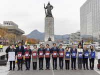 Cho Kuk, leader of the Rebuilding Korea Party, along with party lawmakers, holds a press conference in front of the Admiral Yi Sun-sin statu...