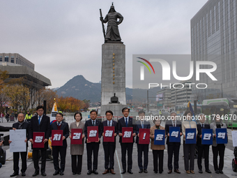 Cho Kuk, leader of the Rebuilding Korea Party, along with party lawmakers, holds a press conference in front of the Admiral Yi Sun-sin statu...