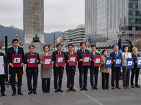 Cho Kuk, leader of the Rebuilding Korea Party, along with party lawmakers, holds a press conference in front of the Admiral Yi Sun-sin statu...