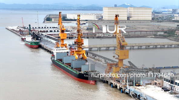 Vehicles shuttle back and forth, and cargo loading and unloading are orderly at Xinhai Wharf in Fuzhou, Fujian province, China, on November...