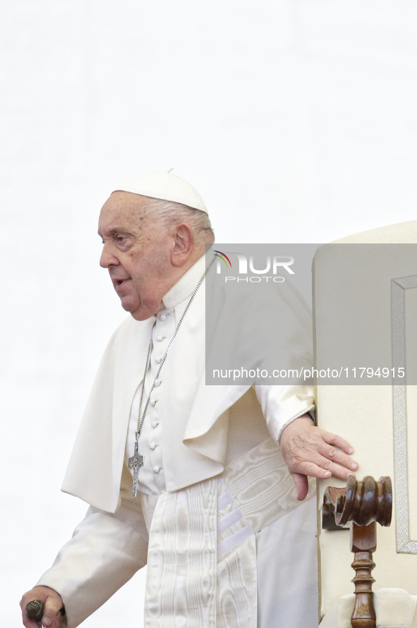 Pope Francis arrives for the weekly general audience at St Peter's Square in The Vatican on November 20, 2024. 