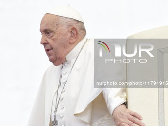 Pope Francis arrives for the weekly general audience at St Peter's Square in The Vatican on November 20, 2024. (