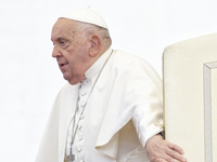 Pope Francis arrives for the weekly general audience at St Peter's Square in The Vatican on November 20, 2024. (