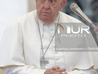 Pope Francis arrives for the weekly general audience at St Peter's Square in The Vatican on November 20, 2024. (