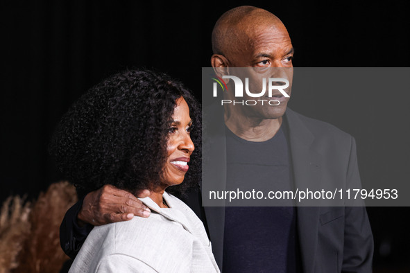 Pauletta Washington and husband Denzel Washington arrive at the Los Angeles Premiere Of Netflix's 'The Piano Lesson' held at The Egyptian Th...