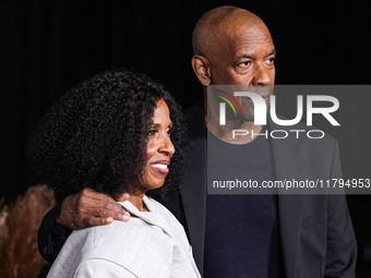 Pauletta Washington and husband Denzel Washington arrive at the Los Angeles Premiere Of Netflix's 'The Piano Lesson' held at The Egyptian Th...