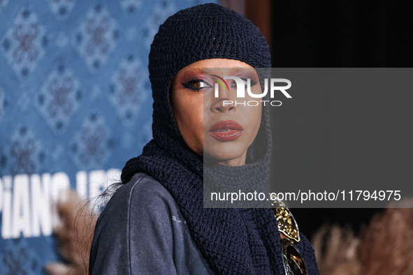 Erykah Badu arrives at the Los Angeles Premiere Of Netflix's 'The Piano Lesson' held at The Egyptian Theatre Hollywood on November 19, 2024...