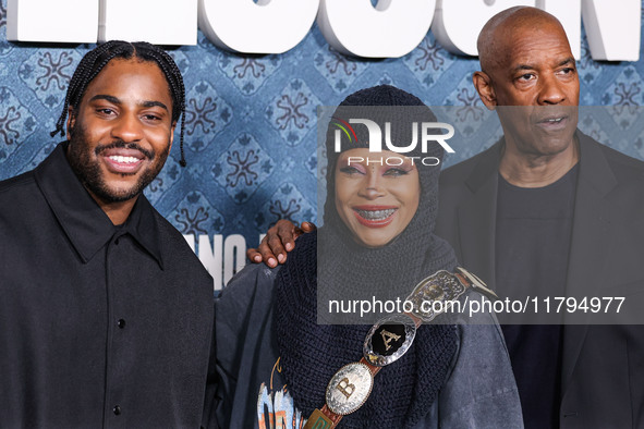 Malcolm Washington, Erykah Badu and Denzel Washington arrive at the Los Angeles Premiere Of Netflix's 'The Piano Lesson' held at The Egyptia...