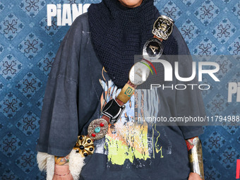 Erykah Badu arrives at the Los Angeles Premiere Of Netflix's 'The Piano Lesson' held at The Egyptian Theatre Hollywood on November 19, 2024...