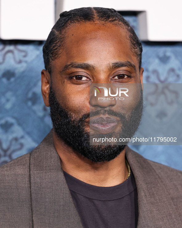 John David Washington arrives at the Los Angeles Premiere Of Netflix's 'The Piano Lesson' held at The Egyptian Theatre Hollywood on November...