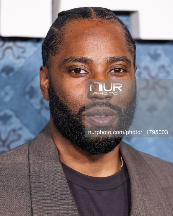 John David Washington arrives at the Los Angeles Premiere Of Netflix's 'The Piano Lesson' held at The Egyptian Theatre Hollywood on November...