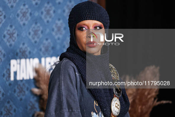 Erykah Badu arrives at the Los Angeles Premiere Of Netflix's 'The Piano Lesson' held at The Egyptian Theatre Hollywood on November 19, 2024...