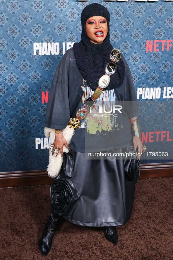 Erykah Badu arrives at the Los Angeles Premiere Of Netflix's 'The Piano Lesson' held at The Egyptian Theatre Hollywood on November 19, 2024...