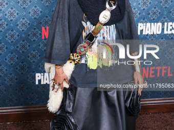 Erykah Badu arrives at the Los Angeles Premiere Of Netflix's 'The Piano Lesson' held at The Egyptian Theatre Hollywood on November 19, 2024...