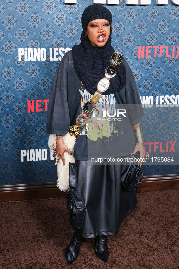 Erykah Badu arrives at the Los Angeles Premiere Of Netflix's 'The Piano Lesson' held at The Egyptian Theatre Hollywood on November 19, 2024...