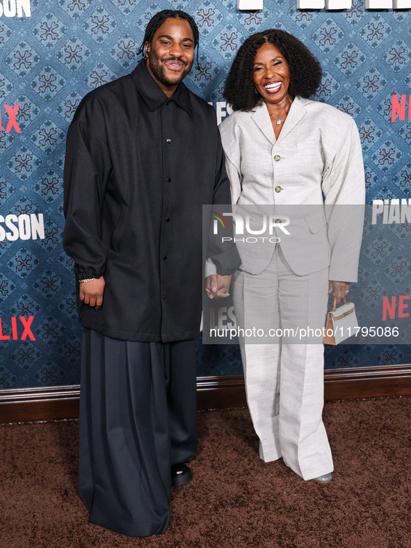 Malcolm Washington and mother Pauletta Washington arrive at the Los Angeles Premiere Of Netflix's 'The Piano Lesson' held at The Egyptian Th...