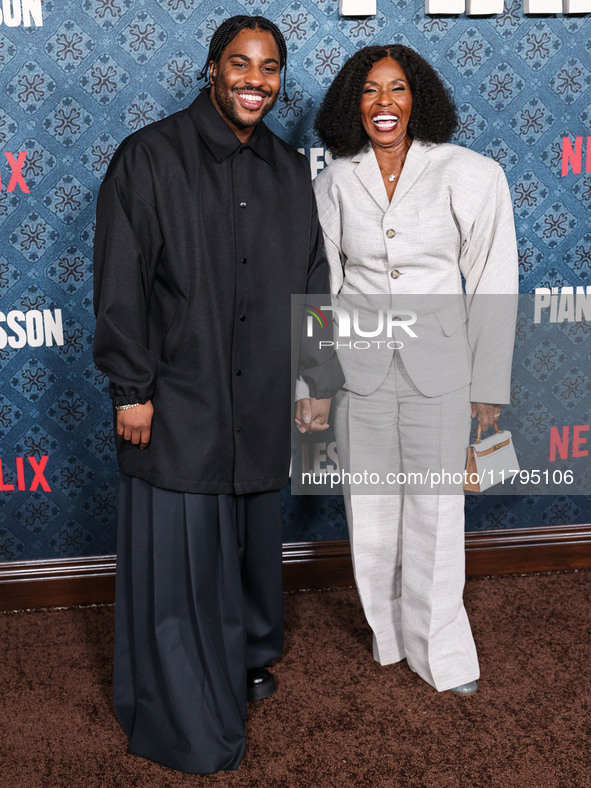 Malcolm Washington and mother Pauletta Washington arrive at the Los Angeles Premiere Of Netflix's 'The Piano Lesson' held at The Egyptian Th...